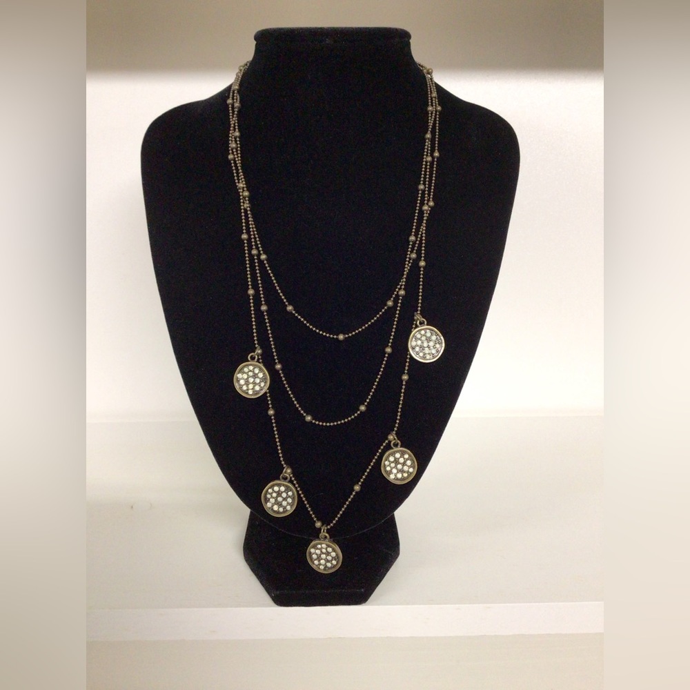Layered chain necklace with boho medallions